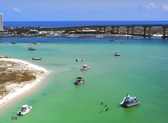Pontoon boats and swimmers in the back bays near Orange Beach, Alabama